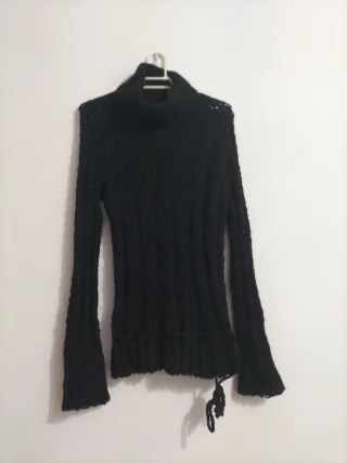 Jersey negro cuello alto de lana brillante elástic