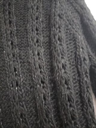 Jersey negro cuello alto de lana brillante elástic
