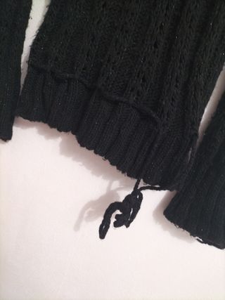 Jersey negro cuello alto de lana brillante elástic