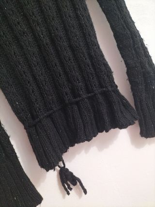 Jersey negro cuello alto de lana brillante elástic