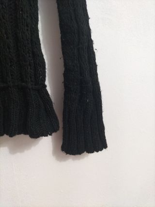 Jersey negro cuello alto de lana brillante elástic