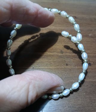 Braccialetto perle fiume su acciaio armonico