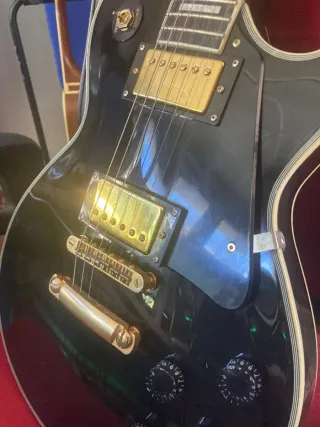 Guitarra Harley Benton Les Paul y ampli Washburn