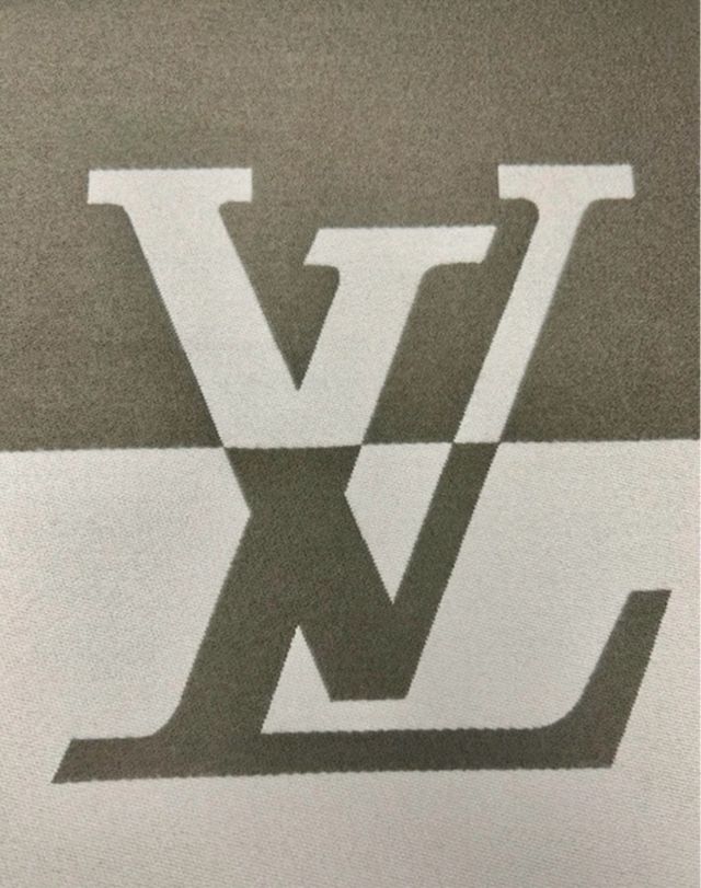 Bufanda Louis Vuitton con flecos