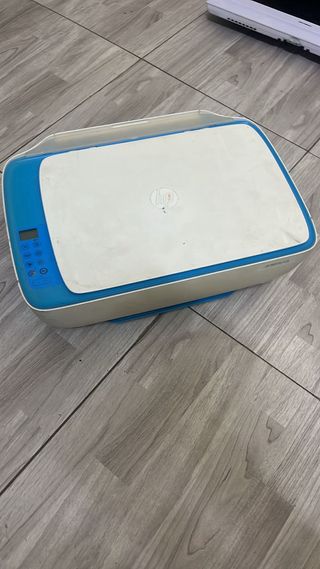 Impresora HP Azul y Blanca