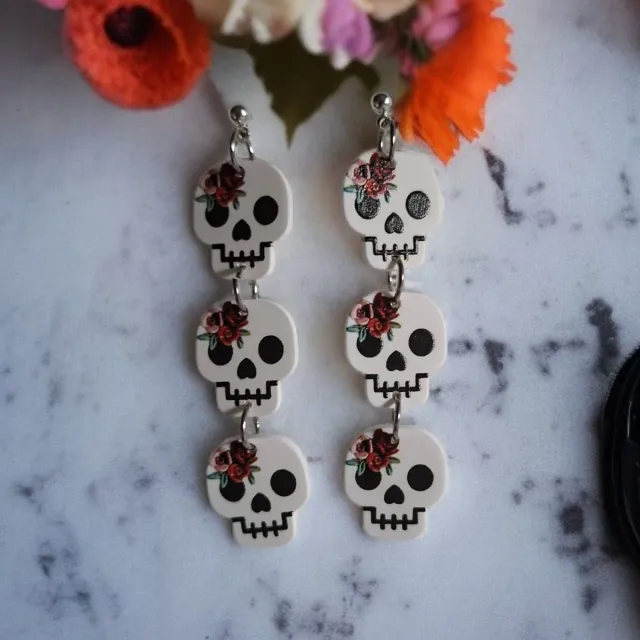 50%Pendientes calavera con flores
