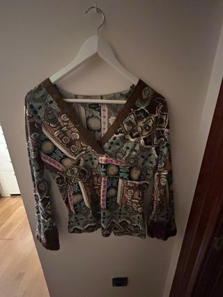 Blusa estampada manga larga