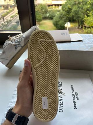Zapatillas Golden Goose Blancas y Plateadas
