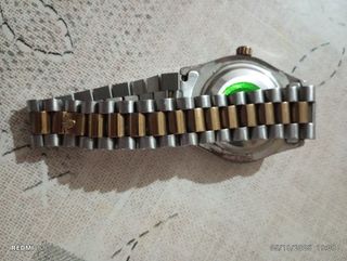 Reloj Rolex Negro y Dorado