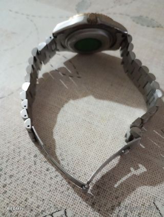 Reloj Rolex Negro y Dorado