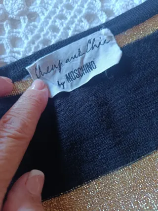 Vestido negro y dorado con lazo