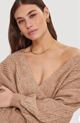 Jersey beige cuello V