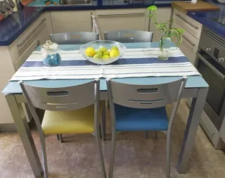 Mesa extensible cristal templado + 4 sillas
