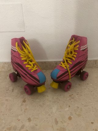 Patines de 4 ruedas rosas y amarillos