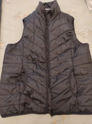 Chaleco unisex no pesa nada,el número es L/XL