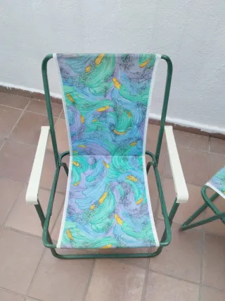 Silla de playa plegable se vende la pareja.