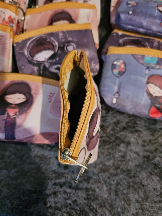 Monederos con diseño de muñeca