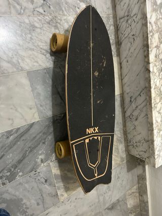 Monopatín NKX blanco y rosa