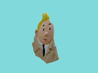 Escultura de Tintin con gabardina imán nevera 