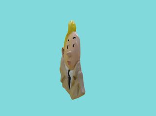 Escultura de Tintin con gabardina imán nevera 