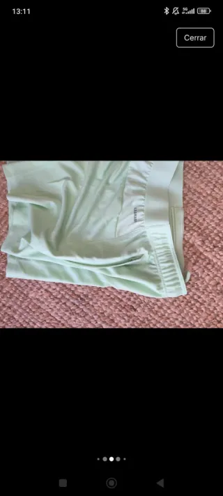 Pantalón corto Adidas con etiqueta