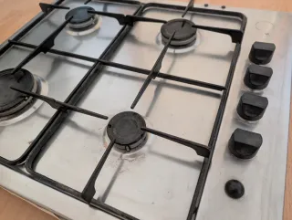 Cocina gas 4 fuegos+horno+campana. Marca Zanussi 