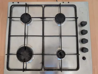 Cocina gas 4 fuegos+horno+campana. Marca Zanussi 