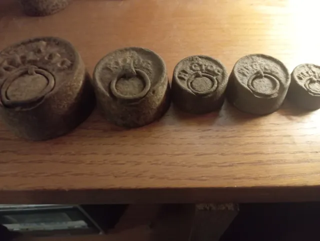 Juego de pesas antiguas