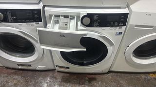 Lavadora Secadora AEG 8/6 kg 1400rpm nueva exposic