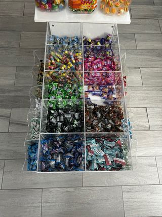 Mesa expositora de caramelos