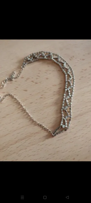 Conjunto de joyería collar y pendientes