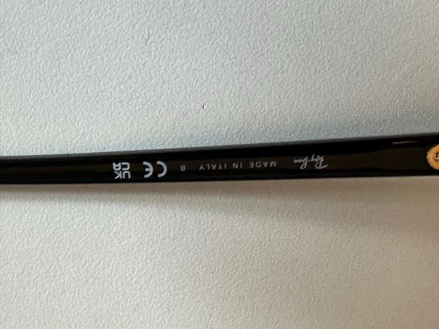 Gafas de sol Ray-Ban Clubmaster negras y doradas