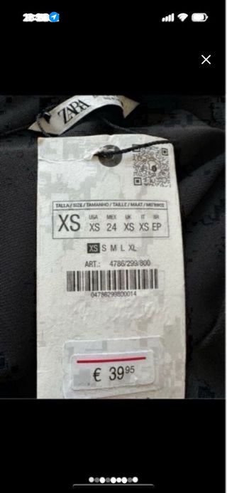 Camisa negra con flecos
Vale para una S
