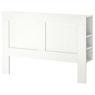 Cabecero blanco con estanterías