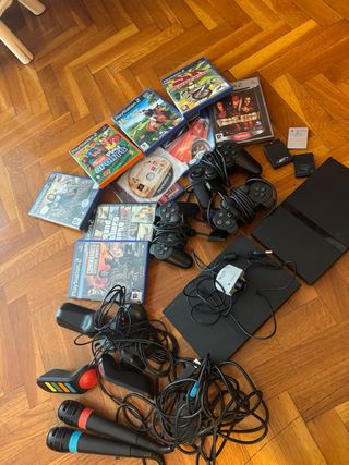 2 PS2 (una no funciona) con juegos y accesorios