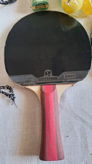 Palas de ping pong,  pelotas y mochila