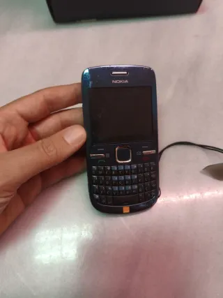 Custodia e caricabatterie originali Nokia C3