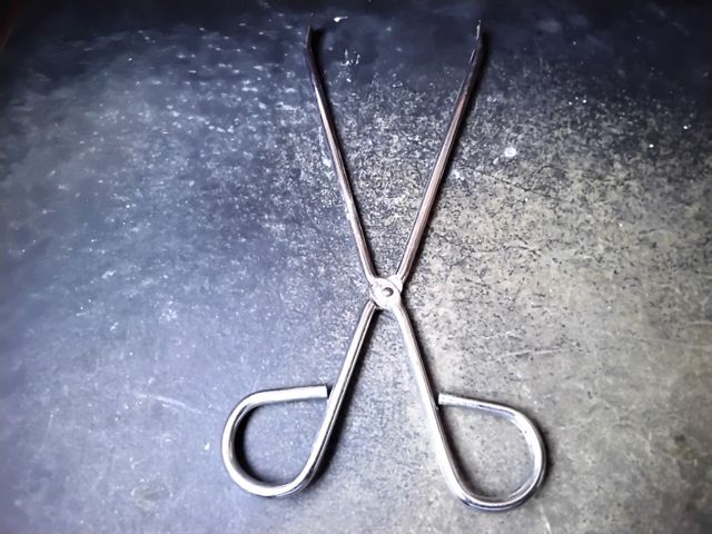 Pinzas de cocina metálicas plateadas