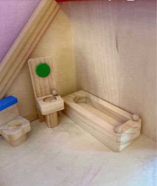 Casa de muñecas de madera