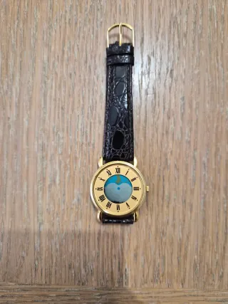Orologio vintage cinturino nero oro