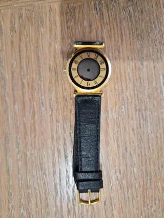 Orologio vintage pelle nera e oro
