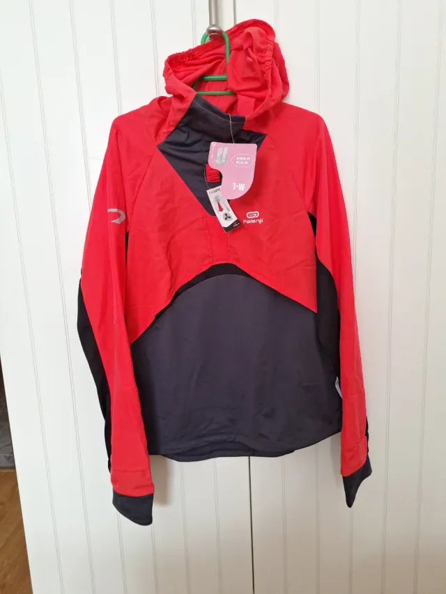 Cortavientos deportivo Kalenji rojo y azul