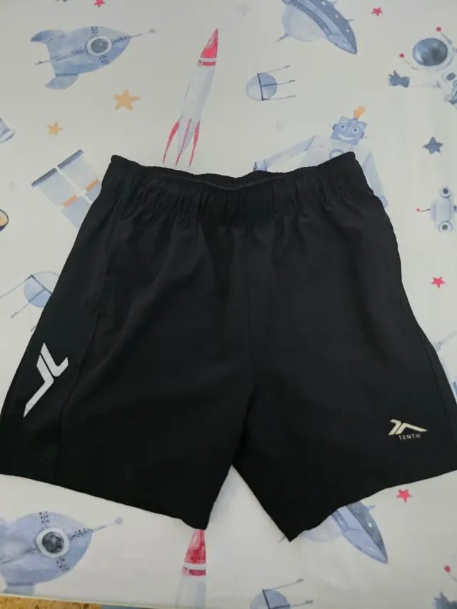 Pantalones cortos deportivos niño/a, talla 12.