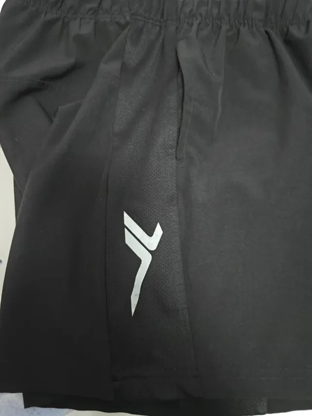 Pantalones cortos deportivos niño/a, talla 12.