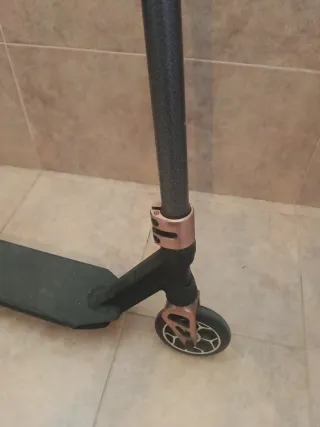 Patinete freestyle negro y cobre