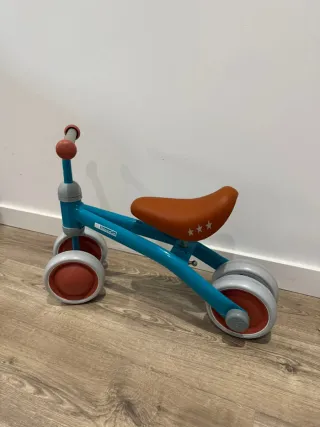 Triciclo infantil azul y naranja