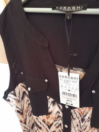 Blusa sin mangas estampada. NUEVA