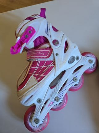 Patines en línea rosas y blancos