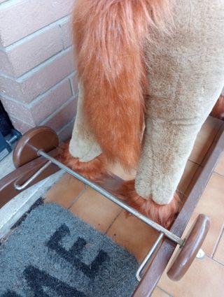 Cavallo a dondolo peluche e legno