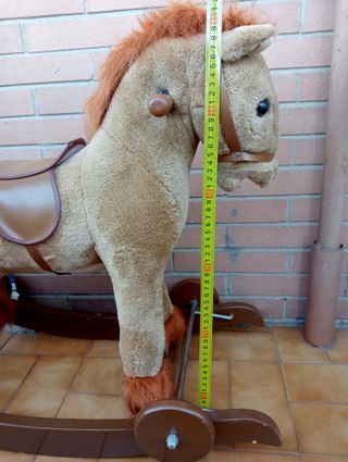 Cavallo a dondolo peluche e legno